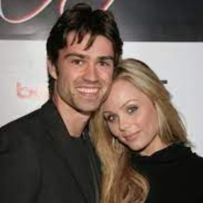 Picture of Corey Sevier and with his ex-girlfriend Laura Vandervaart  wearing black color dress